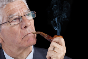 senior businessman smoking